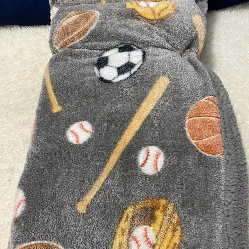 Gray Sports Glow in the Dark Reversible Sherpa Throw.